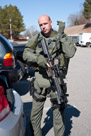A team member puts his gear away after training